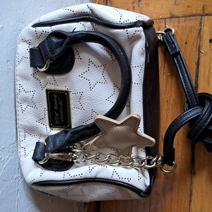 Betsey Johnson leather hand bag/ cross body could be worn as either gently used